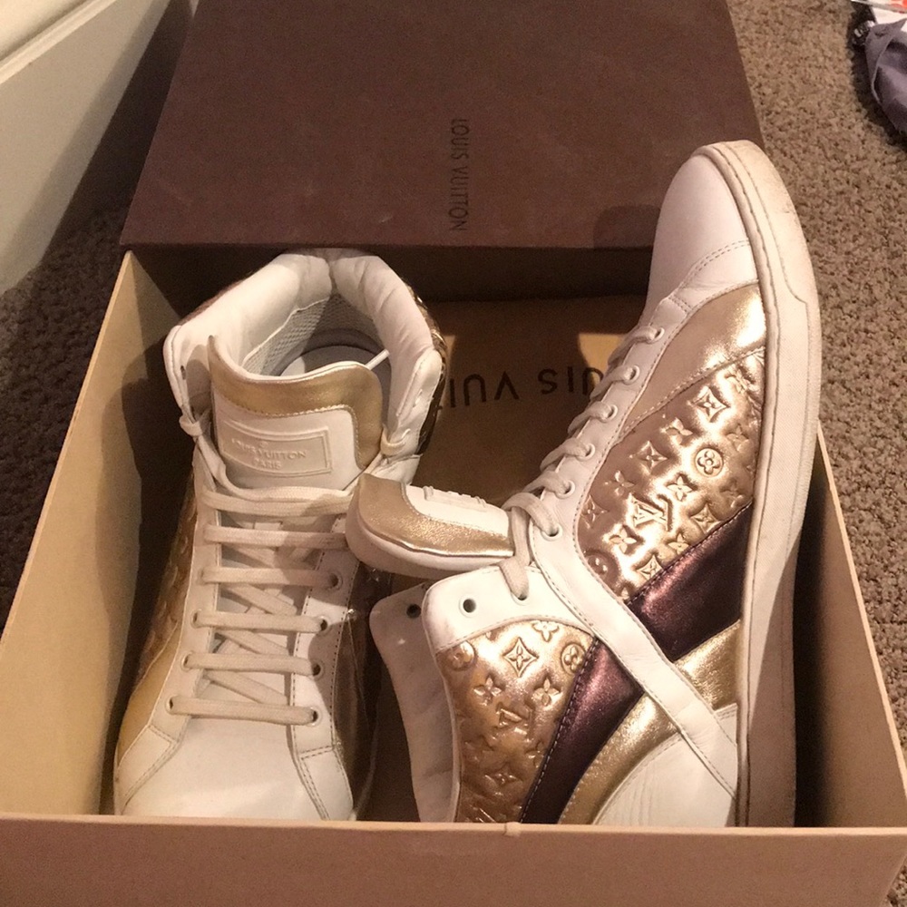 Lightly worn Loui Vuitton high top sneaker gold
